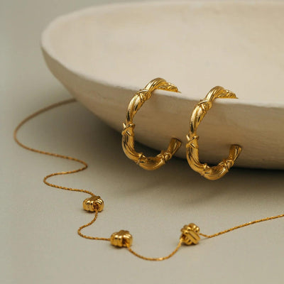 Woven Twist & Cross Mid-Size Hoop Earrings Gold